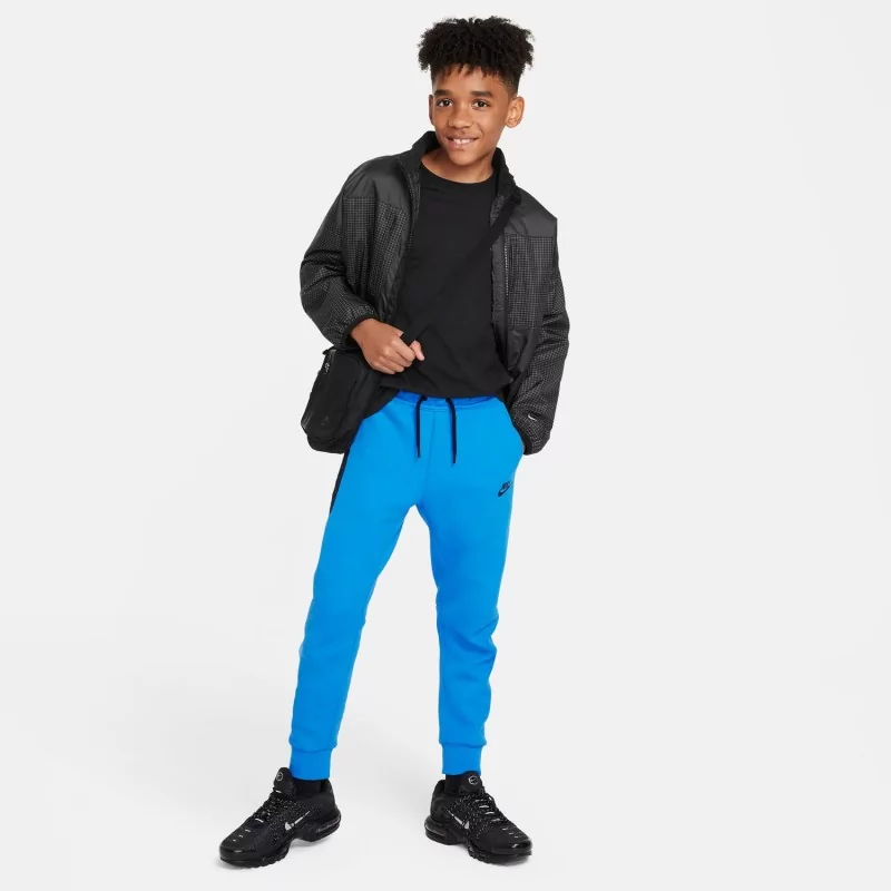 Enfant Pantalons de survêtement et joggers. Nike CA